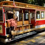 Catching a ride on a cable car in San Francisco