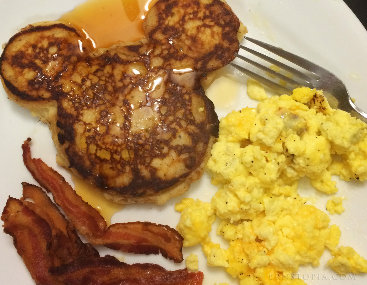 Mickey Mouse pancakes with eggs and bacon